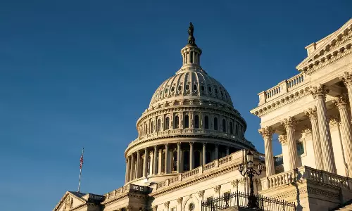 US Congress averts historic default, approves debt-limit suspension