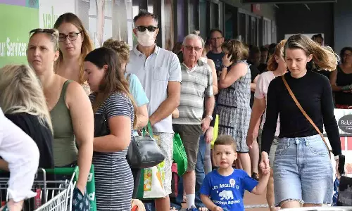 Australia hikes minimum wage as living costs surge