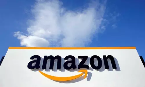 Hundreds join Amazon walkout at HQ over return to work policy