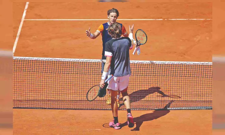 Ruud roars, Jabeur races into quarter-finals Ruud roars, Jabeur races into quarter-finals