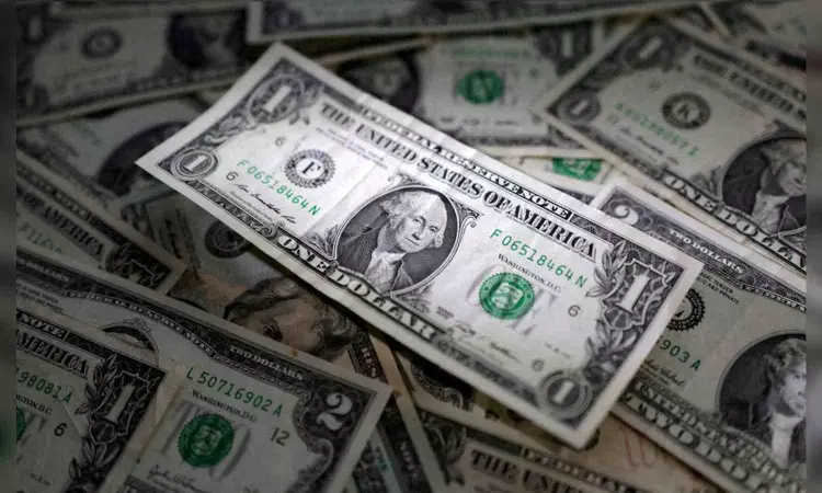 Aussie jumps on RBA hike, U.S. dollar edges higher