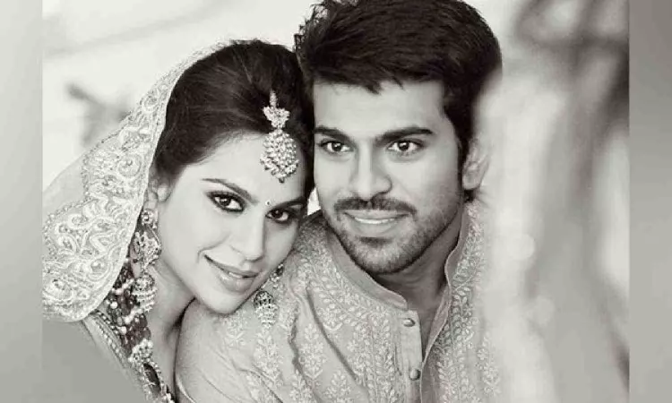 Wedding photo shows Upasana Kamineni resting head on Ram Charans head