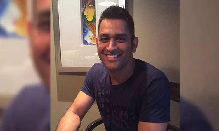 Check out how Dhoni reacted after air hostess served him chocolates