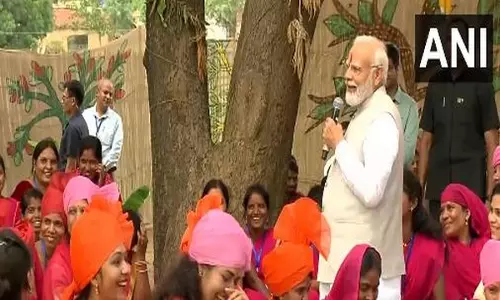Modi interacts with tribal community, self-help groups in Madhya Pradesh