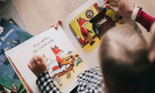 Poverty is linked to poorer brain development,  reading can help counteract it