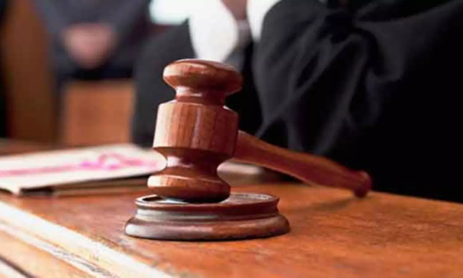 Man sentenced to life for murdering mother and faking death as suicide