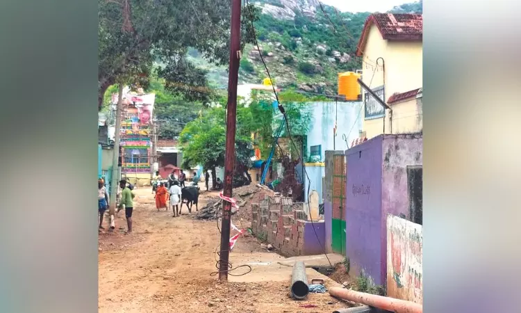 Public suffer as EB, Corpn spar over pole middle of road