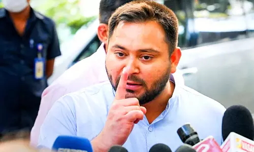 BJP demands Tejashwis resignation inside Bihar assembly