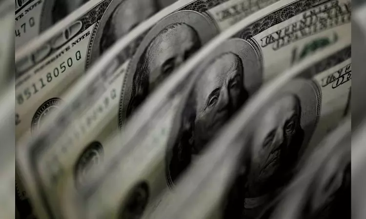 Dollar takes a beating as traders see US rates peaking