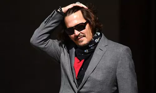 Johnny Depp sells his signed self-portrait for charity