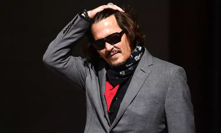 Johnny Depp sells his signed self-portrait for charity