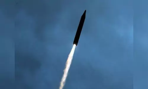 North Korea launched suspected ballistic missile, says Japan