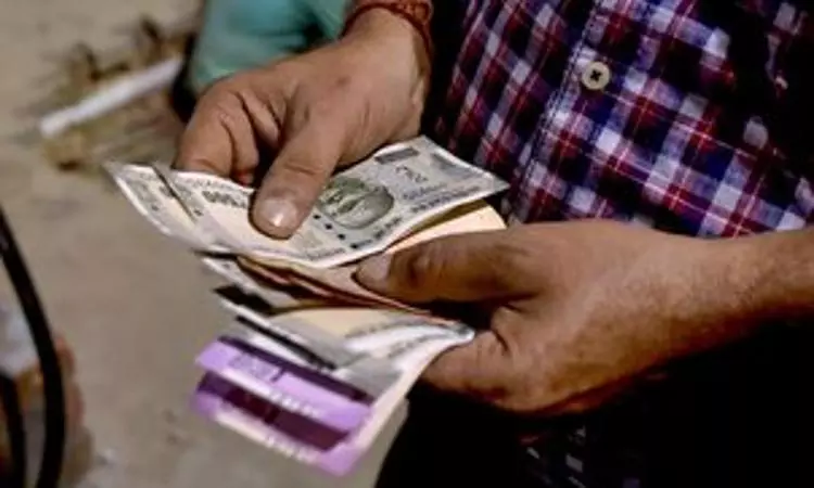 Rupee trades in narrow range against US dollar in early trade
