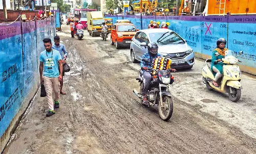 Commuters risk travelling on narrow, slippery Purasawalkam High Road