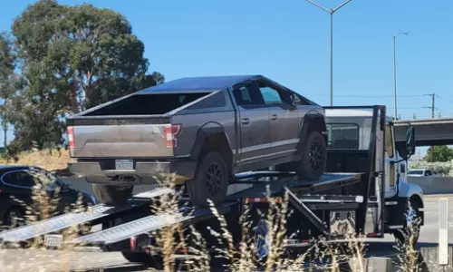 Tesla Cybertruck spotted with Ford F-150 wrap: Report