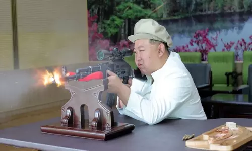 North Korea: Latest photos show Kim Jong Un touring arms factories