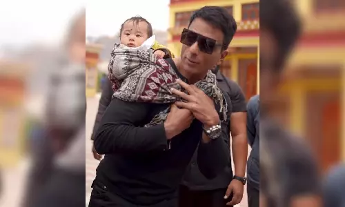 Sonu Sood turns babysitter as he gives piggyback ride to baby in Kaza