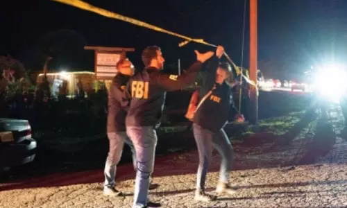 Man who threatened Biden shot dead during FBI raid