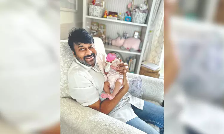 Chiranjeevi smiles holding newborn granddaughter on bday Chiranjeevi smiles holding newborn granddaughter on bday