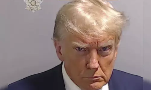 Mug shot of Trump at Atlanta jail shows scowling former president