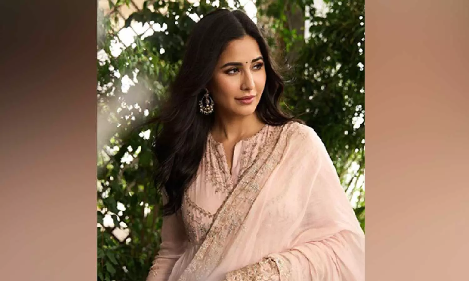 Katrina Kaif drops pics in pink suit, Vicky reacts