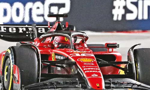 Ferrari on top at Singapore practice with lizards on track