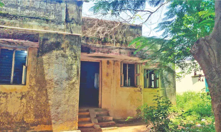 Pending civil works: Mill staff work in dilapidated building