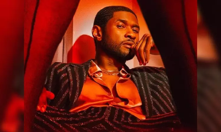 Usher has a ball with his kids in new dance video