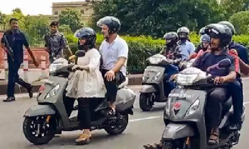 Rahul Gandhi travels with student on scooter in Jaipur