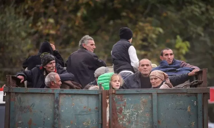 Tens of thousands of ethnic Armenians rush to flee Nagorno-Karabakh