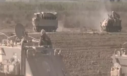 Amid war with Hamas, Israel amass troops along Gaza border