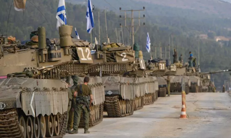 Israel moves hundreds of tanks close to Gaza fence as ground invasion looms