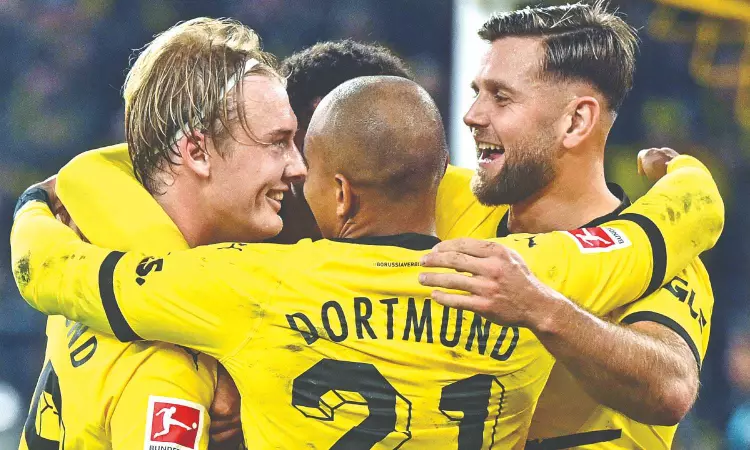Brandt’s goal moves Dortmund to top after 1-0 win over Werder
