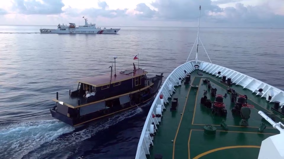 Philippines says Chinese coastguard intentionally collided with its boats