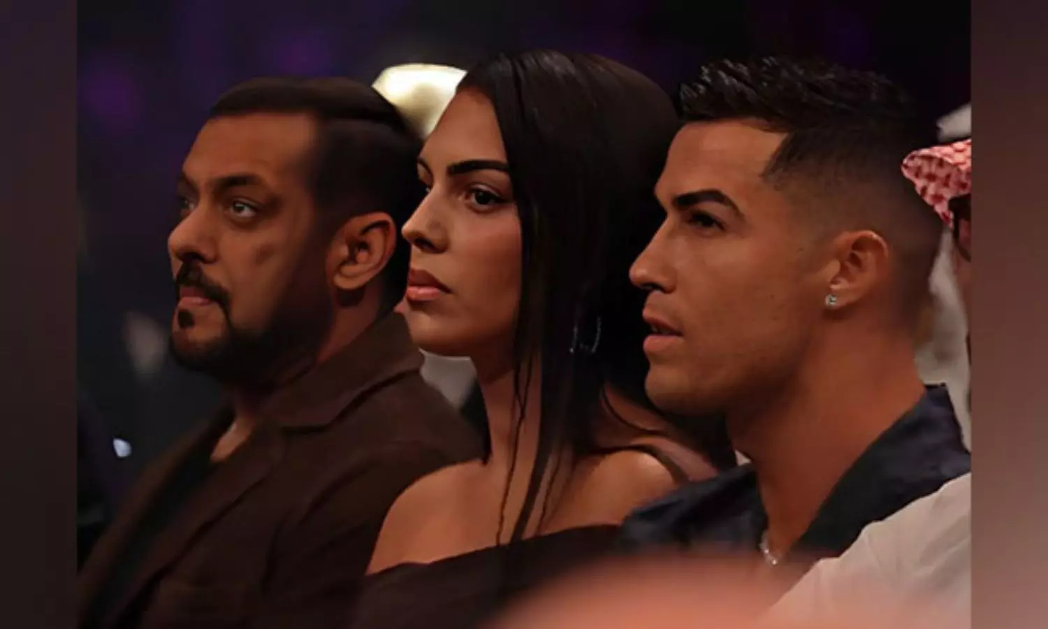 Salman Khan sits next to Cristiano Ronaldo during boxing match in Saudi Arabia