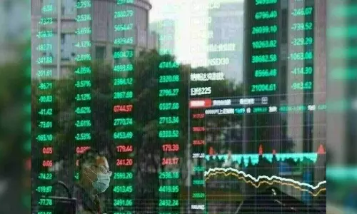 China stocks close down as recovery, global rate concerns weigh