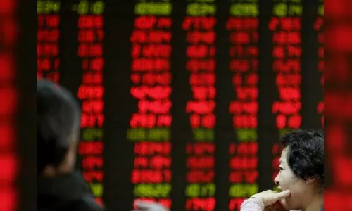 China, HK stocks fall as markets await more stimulus measures