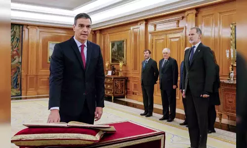 Spain PM Sanchezs new cabinet to keep senior ministers, including Calvino