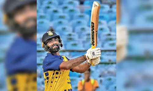 TN beats Baroda as DK slams fifty