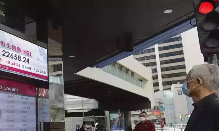 Asia shares turn mixed, gold tops $2,100 an ounce