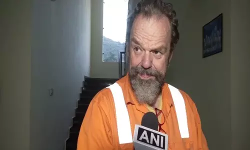 Australian tunnelling expert Arnold Dix calls 41 rescued workers his adopted Indian sons
