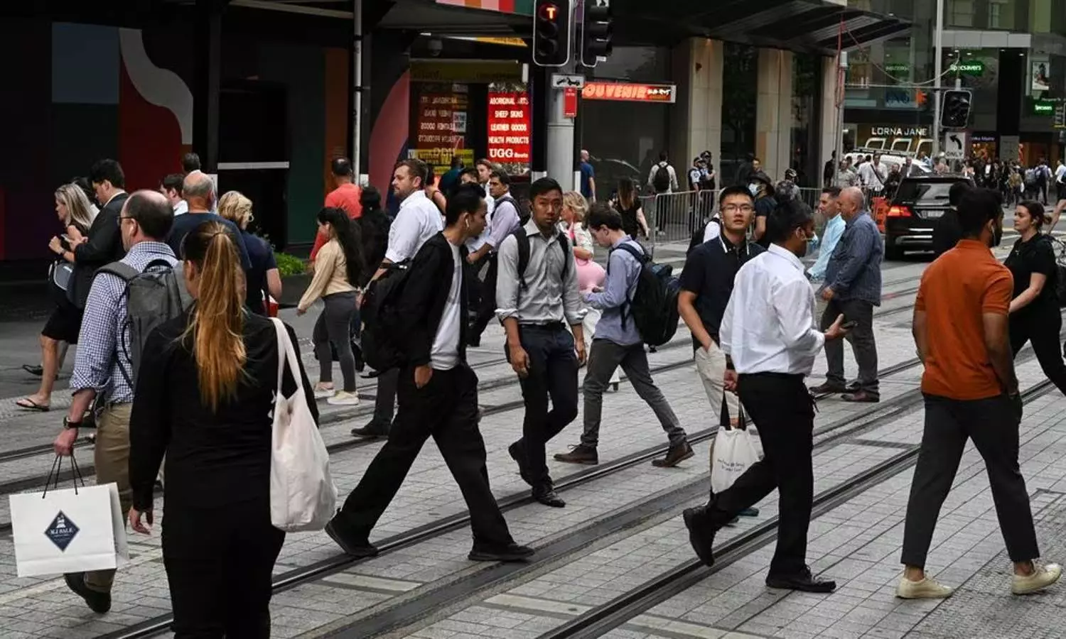 Australia plans to halve migrant intake, tighten student visa rules