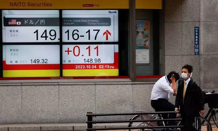 Asian stocks mixed ahead of Fed decision; oil prices slump
