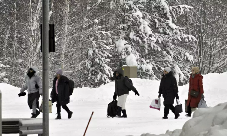 Finland reports a rush of migrant crossings hours before the reclosure of 2 border posts with Russia