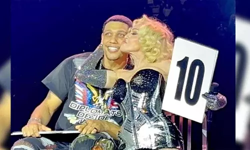 Madonna kisses boyfriend Josh Popper on stage