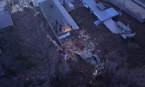 China quake toll reaches 118, rescuers battle sub-zero temperatures to reach survivors