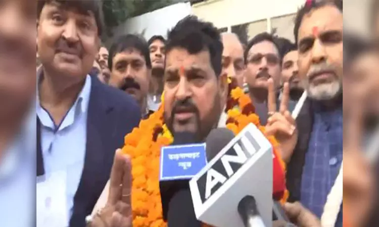 Brij Bhushan celebrates after his aide Sanjay Singh elected WFI president