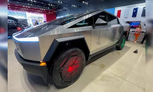 Cybertruck designer says Tesla stainless steel pickup is no experiment