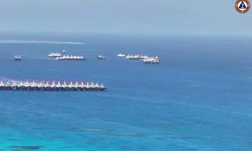 China warns rocket remnants to hit South China Sea