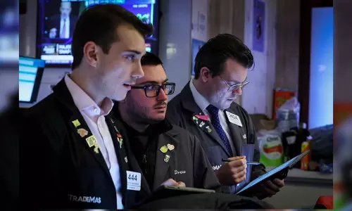 Wall St ekes out modest gains as S&P 500 hovers near all-time closing high